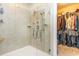 Modern bathroom shower with a glass door and tiled walls at 3672 White Wing Circle, Myrtle Beach, SC 29579