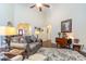 Comfortable living room showing hardwood floors and open access to adjacent rooms in the home at 3672 White Wing Circle, Myrtle Beach, SC 29579