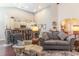 Inviting living room showcases a stylish sofa and seamless transition to the modern kitchen at 3672 White Wing Circle, Myrtle Beach, SC 29579