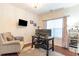 Functional home office with desk, chair, and shelving for organized workspace at 3672 White Wing Circle, Myrtle Beach, SC 29579