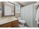 Bathroom featuring single vanity with decorative mirror and shower/tub combination at 3772 Brown Bark Ln., Murrells Inlet, SC 29576