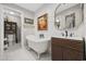 Elegant bathroom featuring a clawfoot tub, a stylish vanity, and white shiplap walls at 3772 Brown Bark Ln., Murrells Inlet, SC 29576