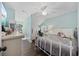 Cozy bedroom with a white metal bed frame, a vanity, and hardwood flooring at 3772 Brown Bark Ln., Murrells Inlet, SC 29576