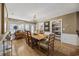 Cozy dining room featuring a chandelier, wood table, and built in shelves at 3772 Brown Bark Ln., Murrells Inlet, SC 29576