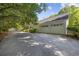 Long driveway leading to a three-car garage, offering ample parking and storage space at 3772 Brown Bark Ln., Murrells Inlet, SC 29576
