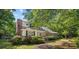 Charming home featuring mature trees, well-maintained landscaping, and inviting front porch at 3772 Brown Bark Ln., Murrells Inlet, SC 29576