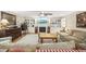 Bright living room with a fireplace, built-in shelving, neutral tones, and a comfortable seating area perfect for relaxing at 3772 Brown Bark Ln., Murrells Inlet, SC 29576