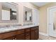 Elegant bathroom with granite counters, dual sinks, and framed mirrors at 3926 Long Avenue Ext., Conway, SC 29527
