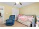Cozy bedroom features a trundle bed, an accent chair and neutral paint at 3926 Long Avenue Ext., Conway, SC 29527