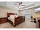 Spacious bedroom with a tray ceiling and a large bed at 3926 Long Avenue Ext., Conway, SC 29527