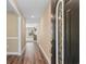 Inviting entryway with wood flooring and a decorative front door with glass detail at 3926 Long Avenue Ext., Conway, SC 29527