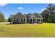 Charming single-story home with a well-manicured lawn and inviting front porch at 3926 Long Avenue Ext., Conway, SC 29527