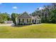 Charming home with manicured lawn, gray siding, and black shutters at 3926 Long Avenue Ext., Conway, SC 29527