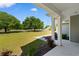 Inviting porch with white columns and well-maintained landscaping at 3926 Long Avenue Ext., Conway, SC 29527