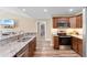 Modern kitchen with granite countertops, stainless steel appliances, and ample cabinet space at 3926 Long Avenue Ext., Conway, SC 29527