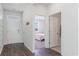 Bright foyer with hardwood floors leading to a bedroom with a window view at 399 Acosta Circle, Conway, SC 29527
