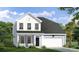 Charming two-story home featuring a welcoming facade, attached garage, and beautifully landscaped front yard at 402 Sun Colony Blvd., Longs, SC 29568