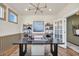 Comfortable home office with large windows, ample shelving, and a modern design at 402 Sun Colony Blvd., Longs, SC 29568