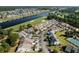 Aerial view showcases property with golf course and water views in residential neighborhood near waterway at 4046 Fairway Lakes Dr. # 4046, Myrtle Beach, SC 29579