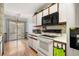 Bright kitchen featuring white cabinets and stainless steel appliances at 4046 Fairway Lakes Dr. # 4046, Myrtle Beach, SC 29579