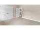 Bedroom features carpet flooring, neutral paint, closet, and a doorway to the hall at 4067 Ridgewood Dr., Conway, SC 29526
