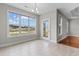Bright dining area with large windows offering serene views and tile flooring at 4067 Ridgewood Dr., Conway, SC 29526