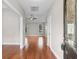 Bright foyer featuring hardwood floors, tray ceilings, and elegant front door at 4067 Ridgewood Dr., Conway, SC 29526