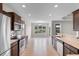 Spacious kitchen with stainless steel appliances, tile flooring and view to eating area at 4067 Ridgewood Dr., Conway, SC 29526