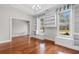 Living room with natural light, hardwood flooring, and built-in shelves at 4067 Ridgewood Dr., Conway, SC 29526