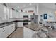 Modern kitchen featuring stainless steel appliances and a stylish granite island countertop at 4341 Grande Harbour Blvd., Little River, SC 29566