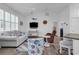 Bright living room featuring coastal decor, vaulted ceiling, and modern furnishings at 4341 Grande Harbour Blvd., Little River, SC 29566