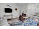 Comfortable living room with a vaulted ceiling, coastal decor, and stylish furnishings at 4341 Grande Harbour Blvd., Little River, SC 29566
