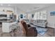 Open-concept living area with stainless steel appliances and coastal decor accents at 4341 Grande Harbour Blvd., Little River, SC 29566