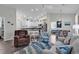 Open living space featuring a kitchen, dining area, and comfortable seating with coastal accents at 4341 Grande Harbour Blvd., Little River, SC 29566