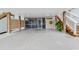 Spacious outdoor area with screened area and open floor with a stairway to the upper level at 4341 Grande Harbour Blvd., Little River, SC 29566
