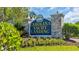 Inviting Carolina Yacht Landing entrance sign with lush landscaping, stone pillars, and nautical theme at 4522 N Plantation Harbour Dr. # E-3, Little River, SC 29566