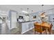 Eat-in kitchen featuring granite countertops, stainless faucet, and tile floors at 4522 N Plantation Harbour Dr. # E-3, Little River, SC 29566