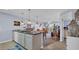 Open kitchen with a breakfast bar, dining table and view of living room at 4522 N Plantation Harbour Dr. # E-3, Little River, SC 29566