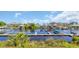 Scenic view of waterfront with docks, multiple residences, and clear sky at 4522 N Plantation Harbour Dr. # E-3, Little River, SC 29566