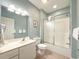 Bright bathroom featuring a shower, vanity, and classic fixtures at 4532 Girvan Dr. # A, Myrtle Beach, SC 29579