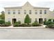 Charming townhome with neutral exterior, manicured landscaping, and convenient parking at 4532 Girvan Dr. # A, Myrtle Beach, SC 29579