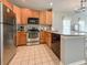 Bright kitchen with stainless steel appliances, tile floors, and granite countertops at 4532 Girvan Dr. # A, Myrtle Beach, SC 29579