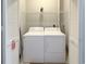 Functional laundry area with washer, dryer, and ample storage space at 4532 Girvan Dr. # A, Myrtle Beach, SC 29579