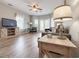 Inviting living room with hardwood floors, stylish furnishings, and a view of the outdoors at 4532 Girvan Dr. # A, Myrtle Beach, SC 29579