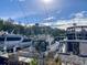 Several boats are docked near the trees on a sunny day with blue skies and fluffy white clouds overhead at 4750 N Huckleberry Ln., Conway, SC 29526