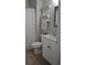 Bright bathroom with a white vanity and a shower with a patterned curtain at 500 Wickham Dr. # 1070, Myrtle Beach, SC 29579