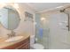 Cozy bathroom with glass-enclosed shower, granite vanity, and modern fixtures at 501 Maison Dr. # F8, Myrtle Beach, SC 29572