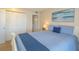 Comfortable bedroom with a closet, light and wall art creating a relaxing space at 501 Maison Dr. # F8, Myrtle Beach, SC 29572
