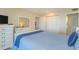 Bright bedroom featuring a dresser, mirror, and plenty of closet space at 501 Maison Dr. # F8, Myrtle Beach, SC 29572