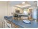 This well-equipped kitchen features stainless steel appliances and plenty of counter space at 501 Maison Dr. # F8, Myrtle Beach, SC 29572